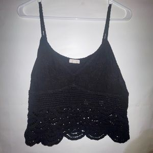 This is a floral lace crop with a v-neck.